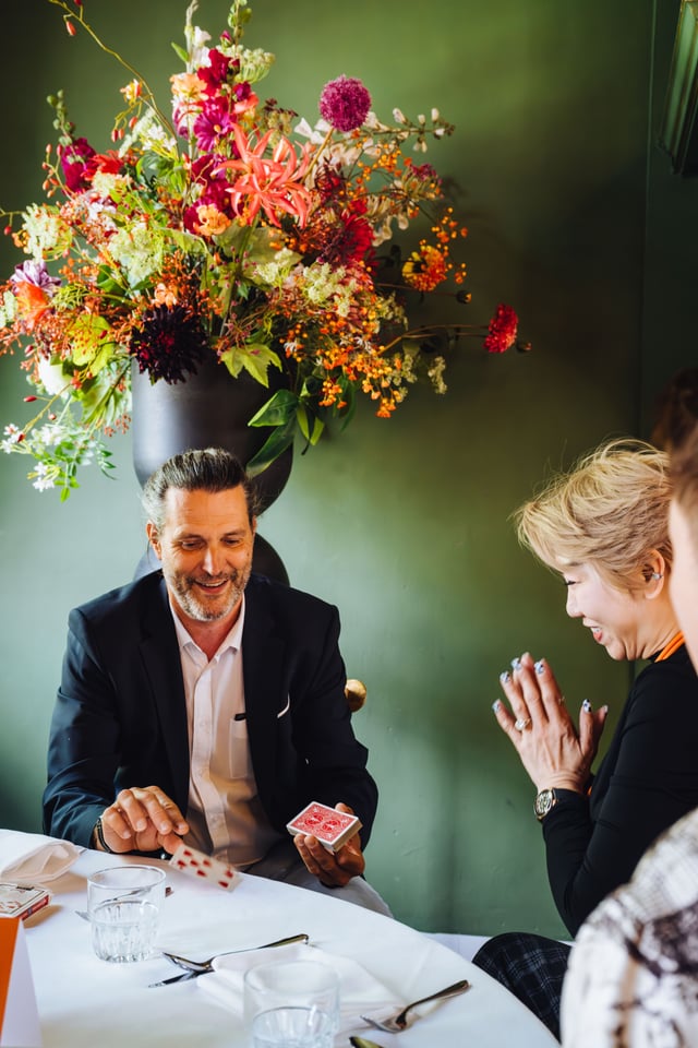 Corporate magician Saint-Tropez performing during a private hospitality reception