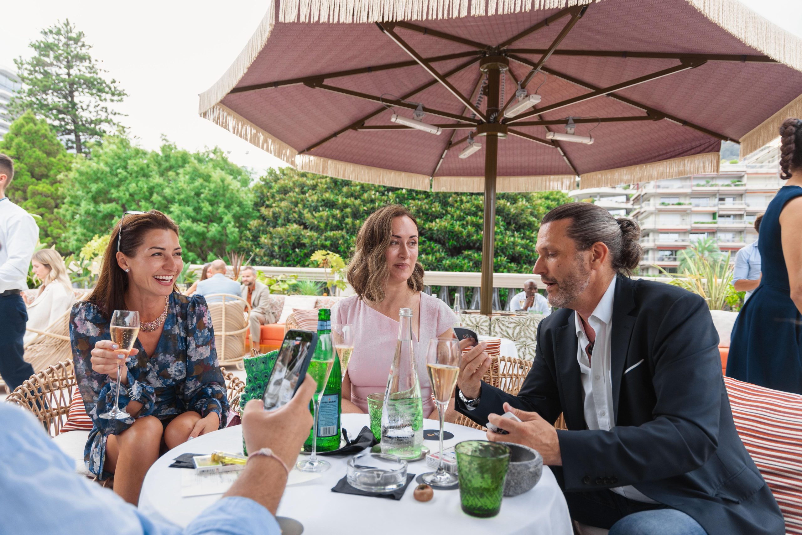 Sieko entertaining guests at an elegant private celebration